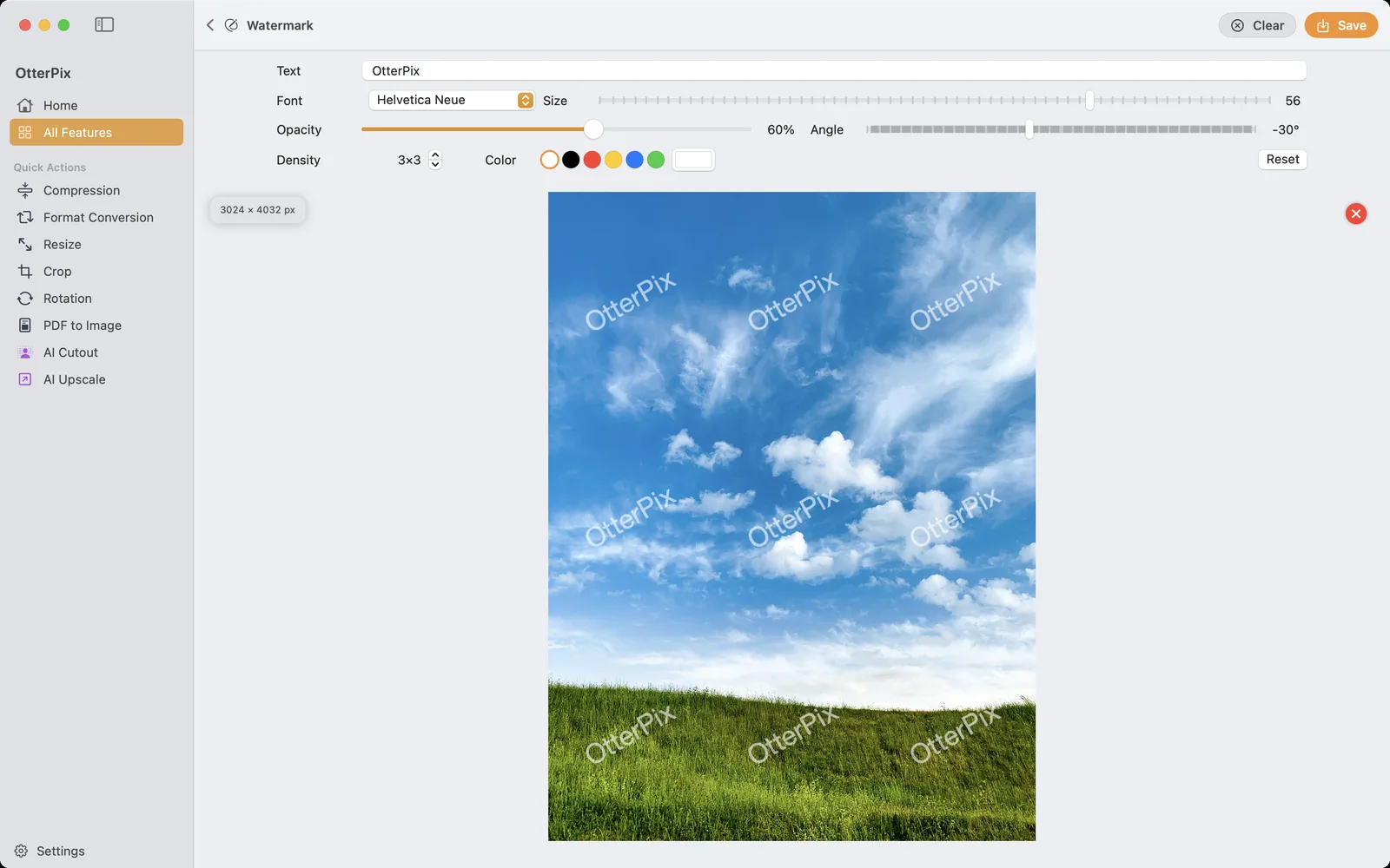 The OtterPix Watermark tool on macOS tiling semi-transparent “OtterPix” text diagonally across a meadow photo, with Font, Size, Opacity, Angle, Density and Color controls above the live preview.